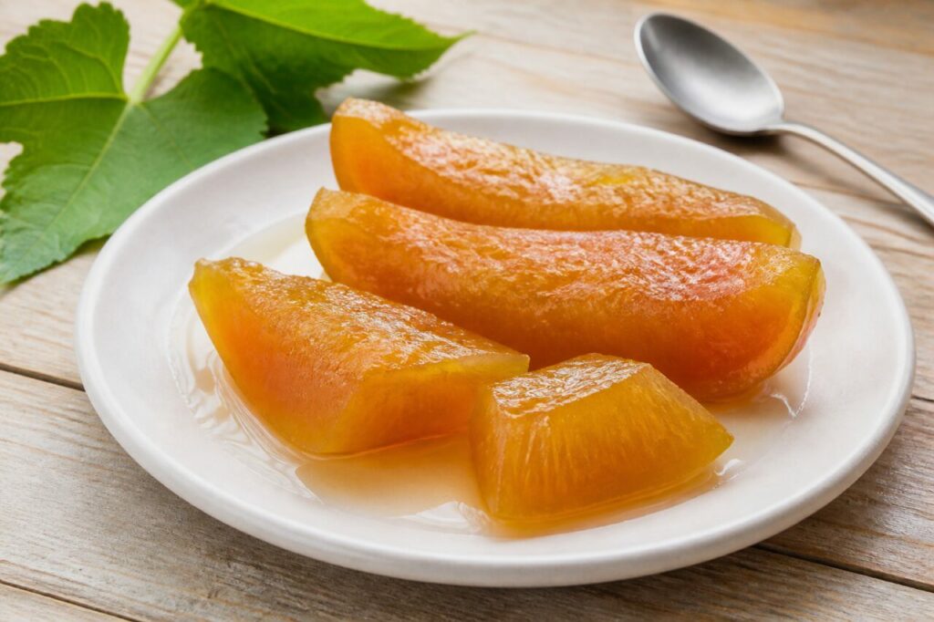 Dulce de mamón paraguayen, quartiers de papaye confits translucides dans un sirop clair